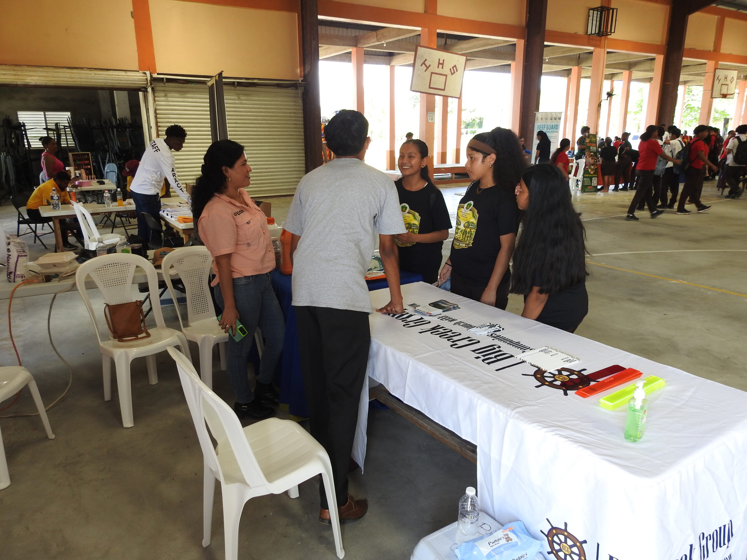 Belagro team explaining to IHS students