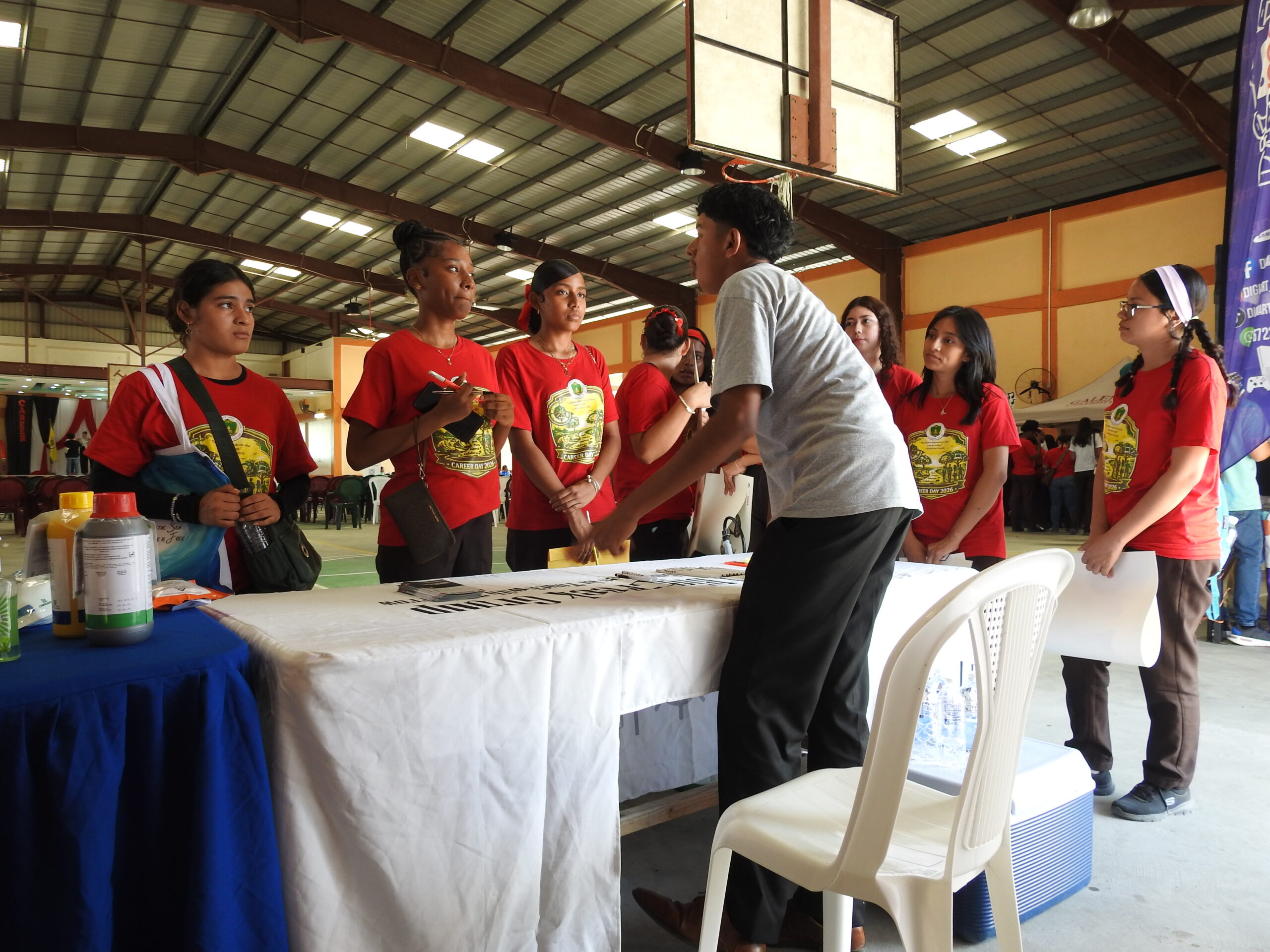 Belagro team explaining to IHS students